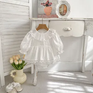 Elegant white cotton baby girl romper with lace collar and puff sleeves for special events