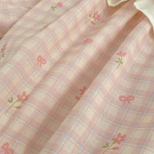 Pagliaccetto neonata a quadretti rosa con stampa floreale e cappello abbinato
