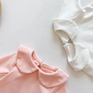 Katoenen baby t-shirt met lange mouwen en Peter Pan kraag in lichtroze en crèmewit