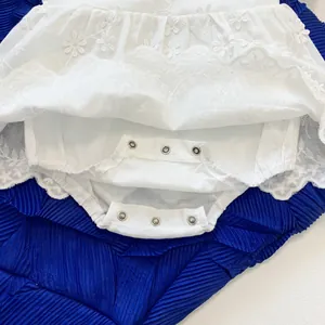 Baby girl white cotton romper dress with floral embroidery and lace trim detail