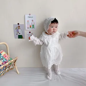 White baby girl lace romper set with flower embroidery, matching bonnet and tights
