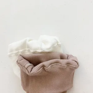 High-waist baby ribbed leggings in white and lotus pink colors for 2025 collection