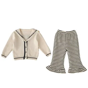 Girls 2-piece knit set with V-neck cream cardigan and striped flared pants with ruffles