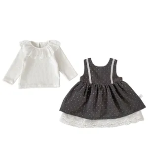 Conjunto de dos piezas para bebé niña con top de encaje y vestido gris de lunares