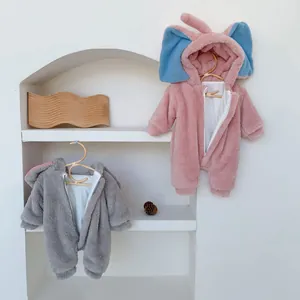 Detail of warm baby elephant rompers showing thick fleece texture and side zipper