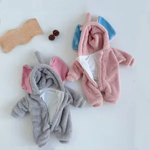 Detailed flat lay of warm elephant baby rompers with plush hood and soft lining