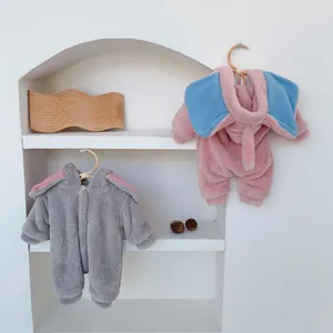 Detail of hooded elephant baby rompers in pink and blue fleece with 3D ears