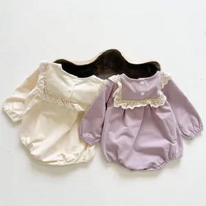 Detail of baby long sleeve rompers with lace collar in cream and lavender colors