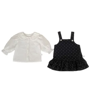 Completo due pezzi bimba: camicia con colletto Peter Pan e vestito scamiciato a pois neri