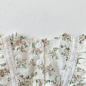 Floral infant long-sleeve romper with vintage print and delicate lace trim detail