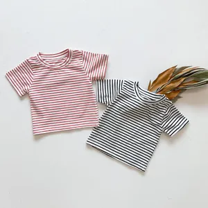 Close-up of soft cotton baby striped short-sleeve bodysuits in red and black