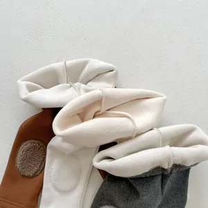 Fleece lined winter leggings for babies in brown, cream and grey with knee patches