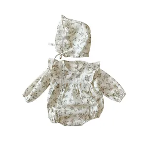 Infant girl floral long-sleeve romper set with matching bonnet and lace detail