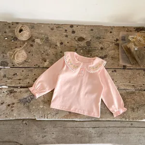 Pink cotton baby shirt with floral embroidered Peter Pan collar and lace trim