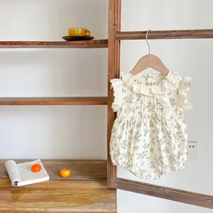 Vintage floral baby girl cotton romper with lace collar and ruffled sleeveless design