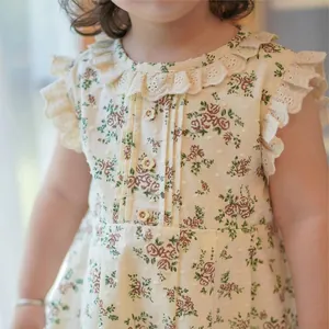 Retro floral baby cotton romper with lace ruffle sleeves and floral buttons