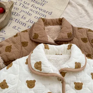 Detail of baby winter jackets featuring bear prints and thick faux lamb wool lining