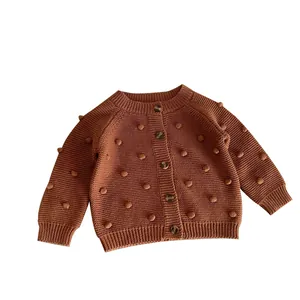Girl's caramel bobble knit cardigan with round neck and wooden buttons in 2024 style
