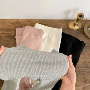 Winter infant rib-knit leggings with sweet bows in grey, pink, white, and black colors