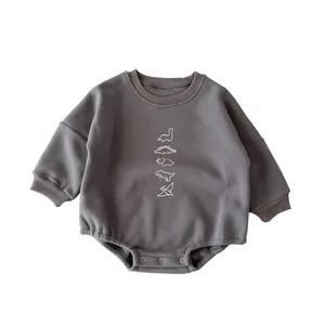 Fleece thickened baby dinosaur romper in dark grey with long sleeves and snap closure