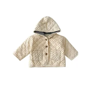 Infant hooded quilted jacket in beige corduroy with black polka dots and wood buttons