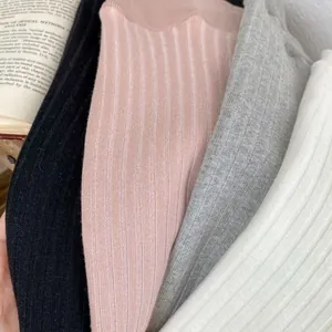Detailed view of winter baby ribbed knit leggings showing soft texture and four classic colors