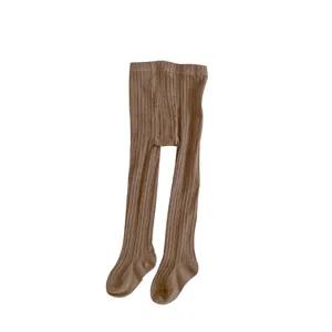Vertical cable-knit baby leggings in dark beige, high-waisted footed style for infants