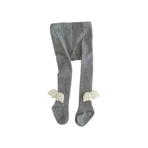 Grey knit baby leggings with cute angel wing decorations on a clean white background