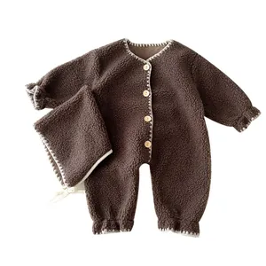 Brown infant fleece romper with matching hat and wooden buttons for autumn and winter
