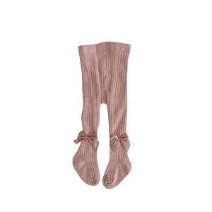 Sweet baby girls ribbed cotton tights with bow detail in lotus root pink color