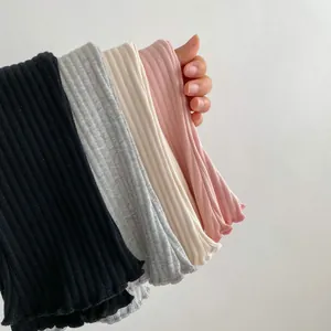 Elastic rib-knit baby flare pants with ruffle hems in black, grey, beige and pink
