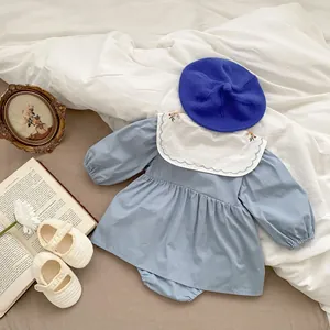 Detail of baby girl floral embroidered collar romper dress with knit beret and shoes