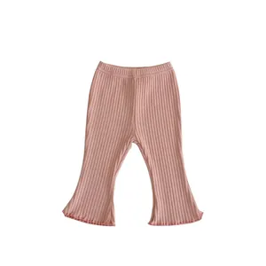 Pink ribbed flare pants for baby girls with elastic waist and ruffle hem details