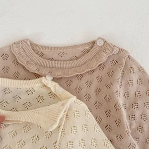 Soft hollow knit baby bodysuit with shoulder buttons in pink and beige colors
