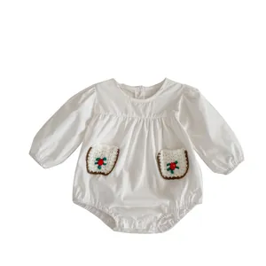 White long-sleeved baby romper with cute plush toast pockets and berry embroidery details