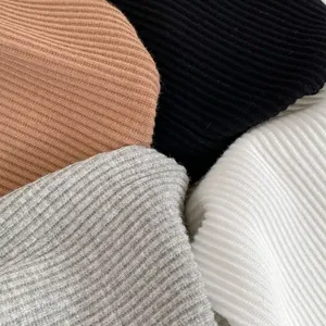 Ribbed knit cotton baby leggings in camel, black, grey and white with soft texture