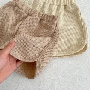 Baby waffle knit shorts set with cute bear embroidery in khaki and off-white colors