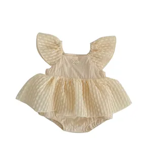 Robe barboteuse bébé fille crème à manches volantées, nœud perlé et tutu en tulle