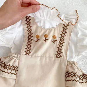 Baby girl floral embroidery romper set with ruffle collar and beige overall dress