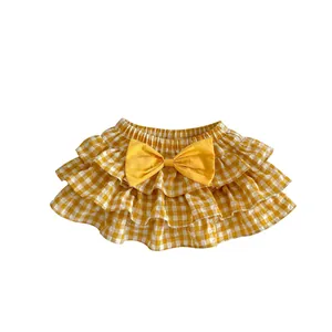 Baby girl gingham skirt with yellow bow, triple-layer ruffles and elastic waist