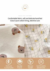 Close-up of Class A pure cotton fabric featuring cute bear prints and yellow floral patterns