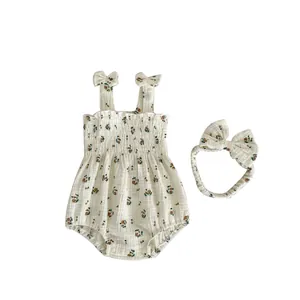 Floral baby girl summer romper set with matching headband and bow straps in cream cotton