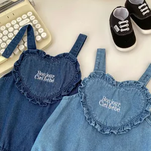 Infant washed denim heart jumpsuit with Bonjour Ciel embroidery in blue and light blue
