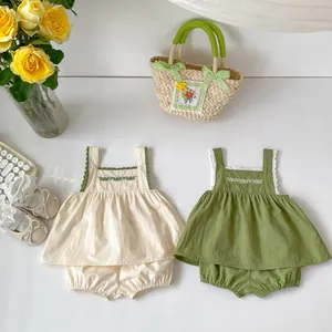 Two-piece baby girls floral strap top and shorts set with embroidery and lace trim