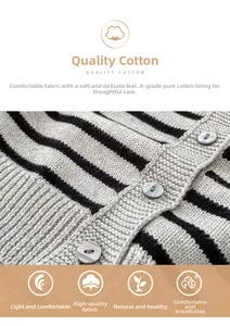 Detail of baby striped knit cardigan showing quality cotton texture and round buttons