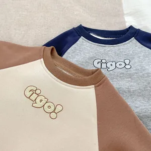 Close-up of contrast raglan sleeve sweatshirts with Gigo letter print and ribbed collars