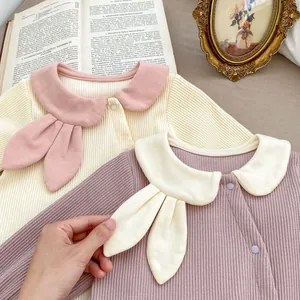 Retro knit baby bodysuits with contrast Peter Pan collars and bow details for girls