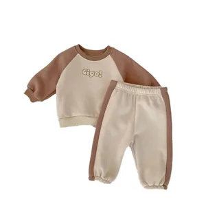 Kids vintage two-piece tracksuit with beige sweatshirt and brown jogger pants