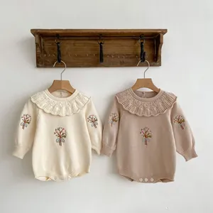 Infant long sleeve knitted romper with lace ruffle collar and floral embroidery detail