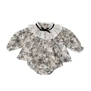 Infant girl fall set featuring floral long sleeve ruffled top and matching bloomers